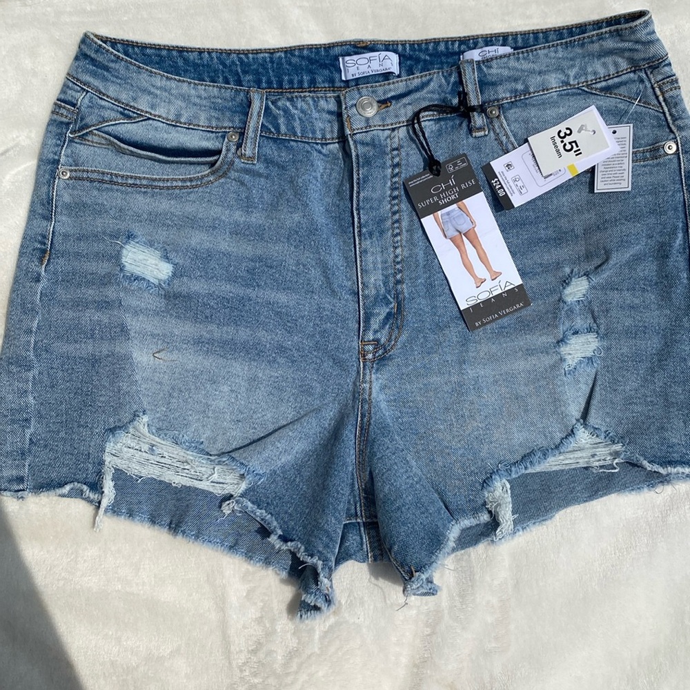 Distressed denim light wash blue jeans
